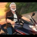 Older guy with friendly smile sitting on motorcycle