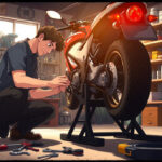A mechanic working on a motorcycle in a garage, focused on removing the front wheel.